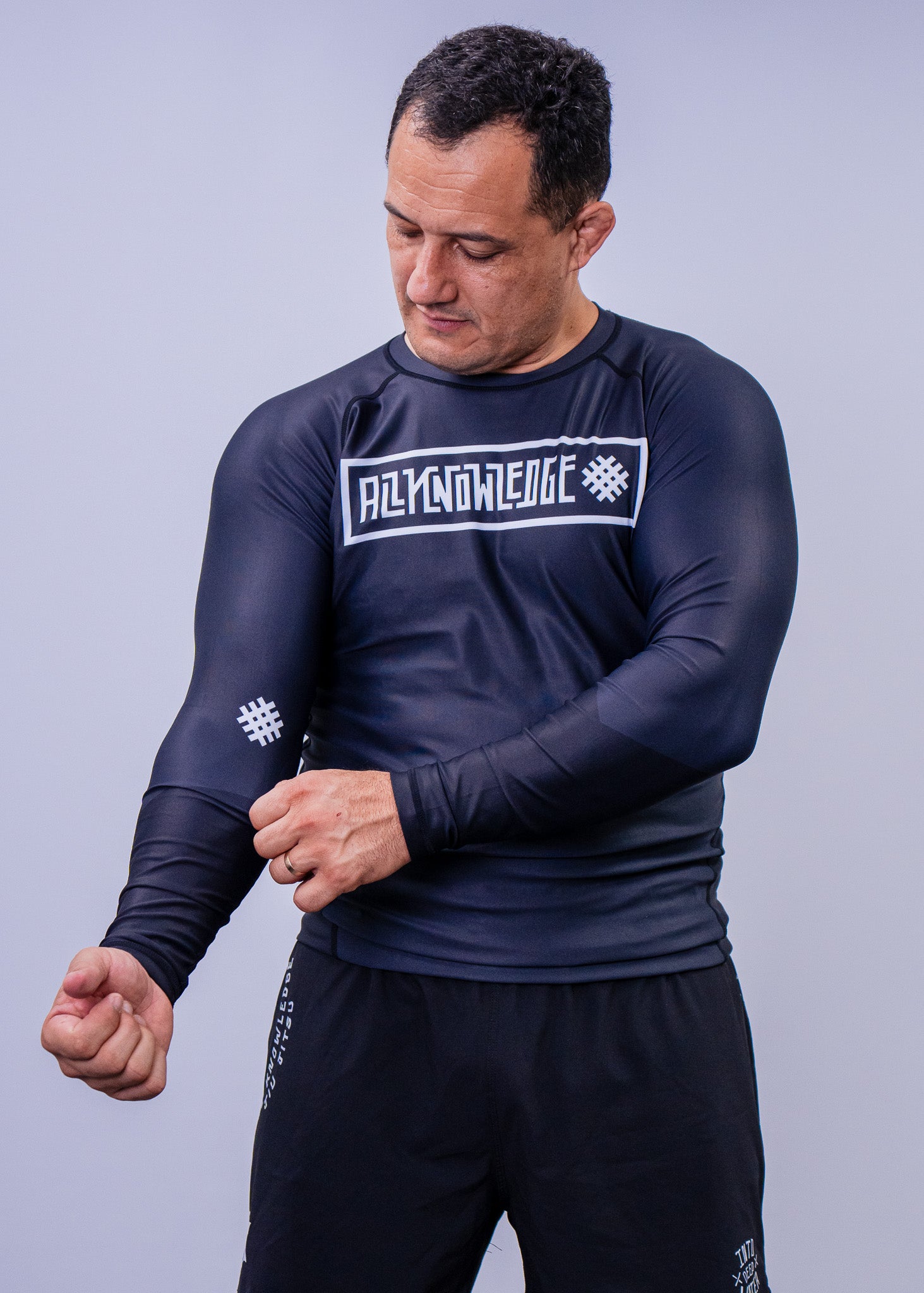 Black Long Sleeve Rashguard by All Knowledge